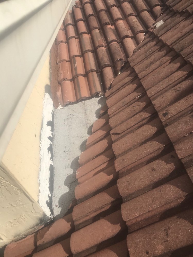 Slide of Red River Roofing