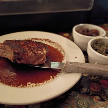 Huck's Place - Pork chop. Greens. Mushrooms - Cajun/Creole Near Me - Columbus, Mississippi Huck's Place - Pork chop. Greens. Mushrooms - Cajun/Creole Near Me - Columbus, Mississippi