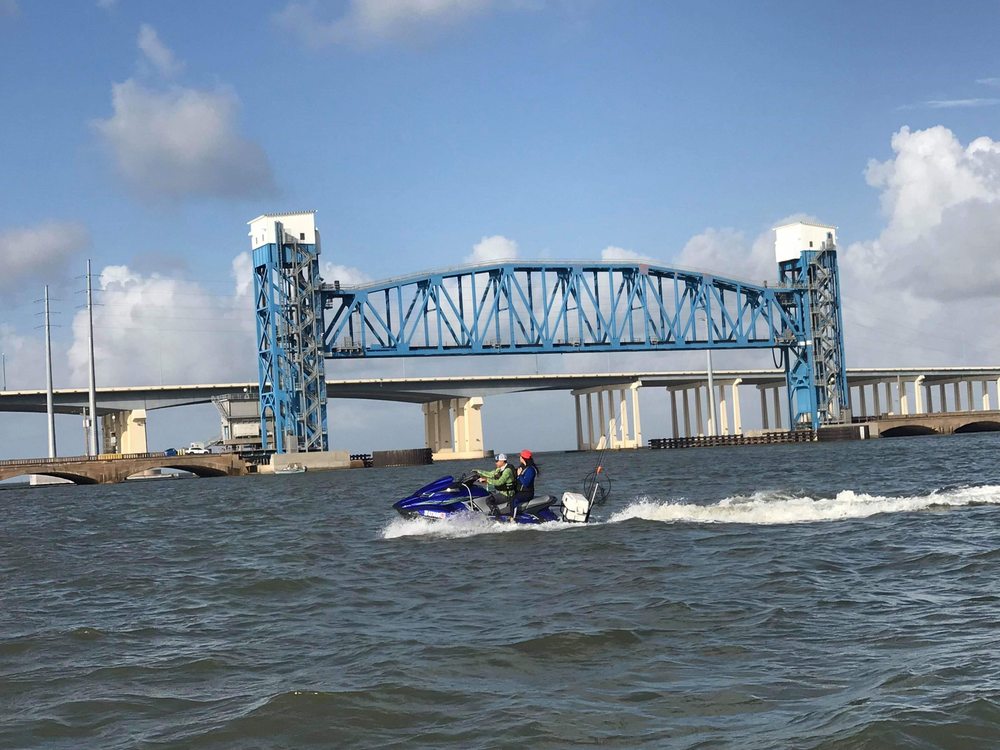 Tiki Island Village of Logo