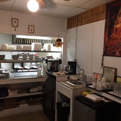 Sweet Basil Thai Restaurant - Clean, organized kitchen, visible from dining room