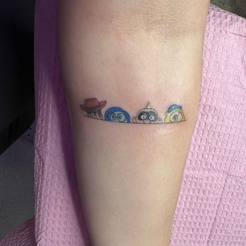 Crispy Aura Fine Line Tattoos - PIXAR! Woody, Sadness, Jack Jack, and Mike! - Tattoo Near Me - Chicago, Illinois Crispy Aura Fine Line Tattoos - PIXAR! Woody, Sadness, Jack Jack, and Mike! - Tattoo Near Me - Chicago, Illinois