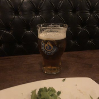 Gerti's - Creemore Beer and what's left of the salmon and Mediterranean salad I could not stop eating!! - Gastropubs Near Me - Peterborough, Ontario