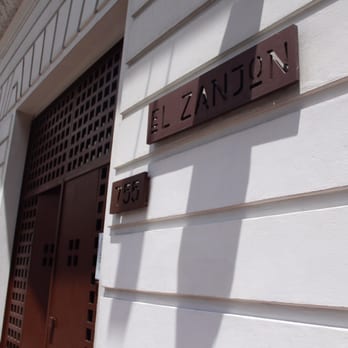 El Zanjón - A rather unassuming building - a small sign outside. - Museums Near Me - Buenos Aires, C