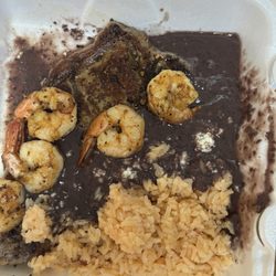 Los Poblanos Eatery - Overcooked steak, decent shrimp, bland rice and bean water. There was not a solid bean on this plate. $25. It's like no one cares anymore