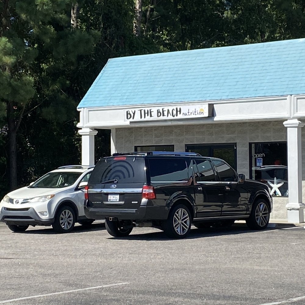 By The Beach Nutrition - a car parked in front of a building - Juice Bars & Smoothies Near Me - Myrtle Beach, South Carolina By The Beach Nutrition - a car parked in front of a building - Juice Bars & Smoothies Near Me - Myrtle Beach, South Carolina