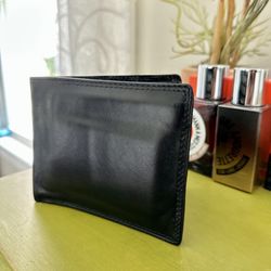 T -Nobile - SUPER high quality leather and craftsmanship, but over 90% less expensive than my last several designer wallets!