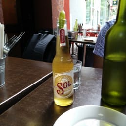 5 dollar sol beer at happy hour. 5 PM to 7 PM.