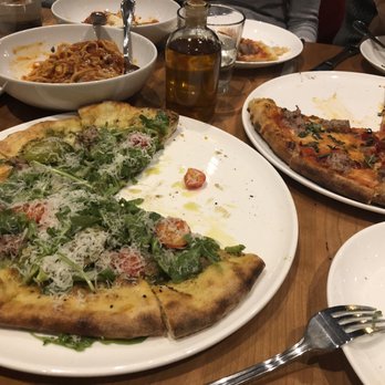 Nook - The pizza in the foreground was the special. But hopefully the pic gives you a reference to portions. - Pizza Near Me - Vancouver, British Columbia