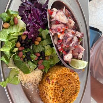 La Parrilla - Octopus salad with Arroz Mamposteao. - Latin American Near Me - Luquillo, Puerto Rico La Parrilla - Octopus salad with Arroz Mamposteao. - Latin American Near Me - Luquillo, Puerto Rico