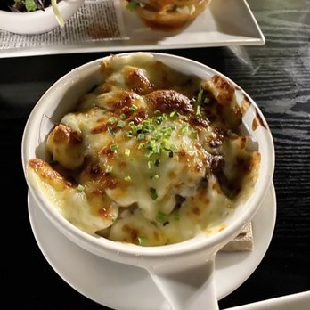 The State - Poutine. Too cheesy for my taste and there wasn't enough fries mixed in - New American Near Me - Redlands, California