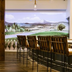 The Grove Tasting Room - A projection mapping installation displays a typical vineyard day in the Willamette Valley.