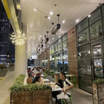 True Food Kitchen - Outside seating by the entrance - New American Near Me - Austin, Texas True Food Kitchen - Outside seating by the entrance - New American Near Me - Austin, Texas