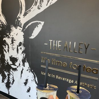 The Alley - two drinks in front of a sign - Coffee & Tea Near Me - Ottawa, Ontario The Alley - two drinks in front of a sign - Coffee & Tea Near Me - Ottawa, Ontario