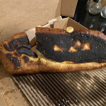 Romeo's Pizza - a burnt pizza in a box - Pizza Near Me - Wadsworth, Ohio