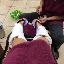 M&M Spa - Provide disposable flipflops and wrap your calves in steam towels while they paint your toenails!
