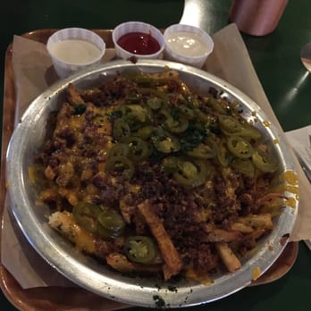 Rodeo Goat - cheese fries + surprise was the size of a medium pizza - Burgers Near Me - Dallas, Texas Rodeo Goat - cheese fries + surprise was the size of a medium pizza - Burgers Near Me - Dallas, Texas