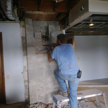 Two Mules Construction - Taking down a chimney from inside. Demo. Mules do all kinds of home improvements. - Landscaping Near Me Two Mules Construction - Taking down a chimney from inside. Demo. Mules do all kinds of home improvements. - Landscaping Near Me