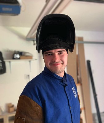About Us - ATX Gate opened March 2020 as a small family business. Our mission was to create a career opportunity for our autistic son. In 2018 he began welding in high school and quickly knew this was his future career field. 

One year after starting in the garage of our home, we moved into a larger workshop space and began expanding the business. Every week brings new jobs and new firsts for us.  From walk gates to 45' cantilevers, barrier gates and custom golf netting. 

We take pride in all we do.  Reach out today for a free quote for your next project!