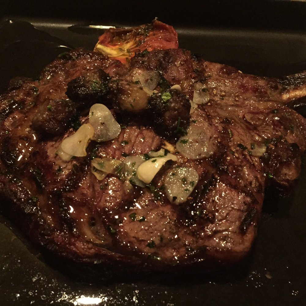 Dawson's - 18 oz ribeye with bone marrow crust on top. Not as big as you think it is though - Steakhouses Near Me - Sacramento, California