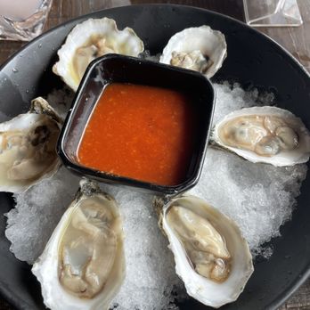 DRIFT - a plate of oysters with a dipping sauce - New American Near Me - Gloucester, Massachusetts DRIFT - a plate of oysters with a dipping sauce - New American Near Me - Gloucester, Massachusetts