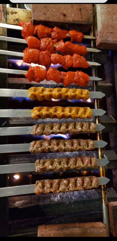 Taste Of Kabul Kabob House Logo