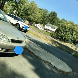 US Post Office - Just obnoxious! The lot is one way in/ out. This lady jerk parked the wrong way in the exit lane and got out of her vehicle to go inside.