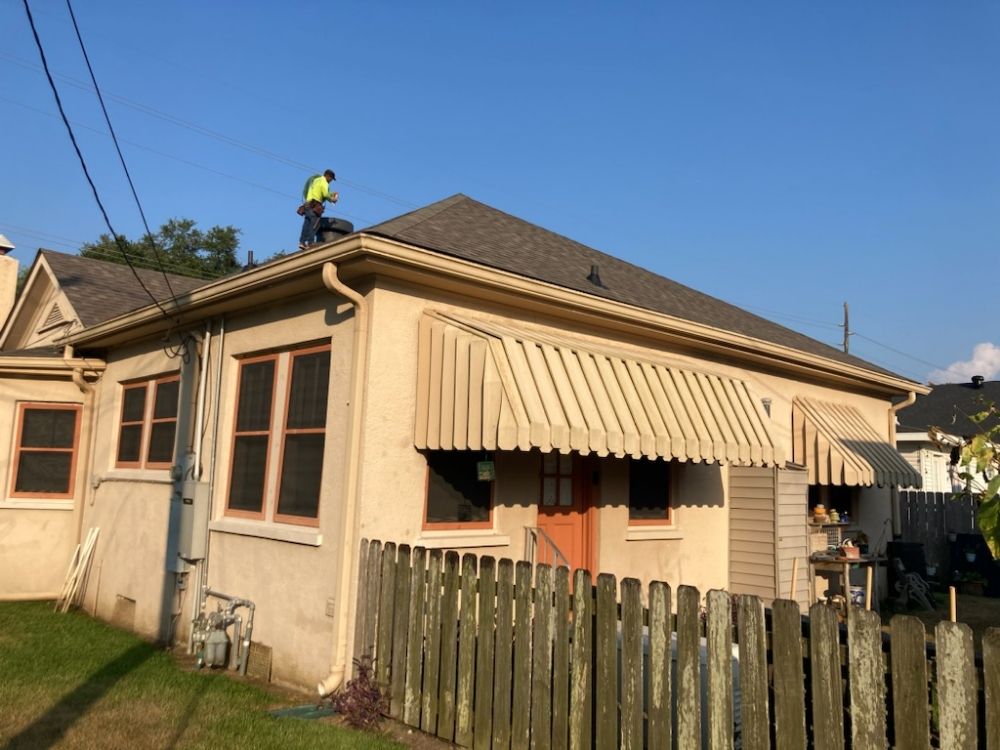 Slide of Peak Roofing Solutions