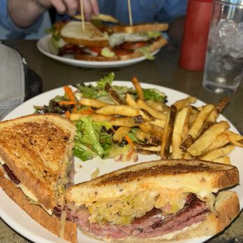 Railroad Station Bar and Grill - Amazing Rueben sandwich, comes with fries and salad. - New American Near Me - Cloverdale, California Railroad Station Bar and Grill - Amazing Rueben sandwich, comes with fries and salad. - New American Near Me - Cloverdale, California