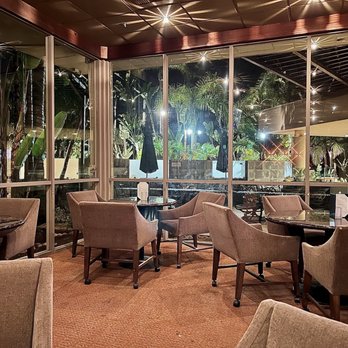 Shooters Bar & Grill - Dining area. Great view of the outdoor patio and surrounding trees. - American Near Me - La Jolla, California Shooters Bar & Grill - Dining area. Great view of the outdoor patio and surrounding trees. - American Near Me - La Jolla, California
