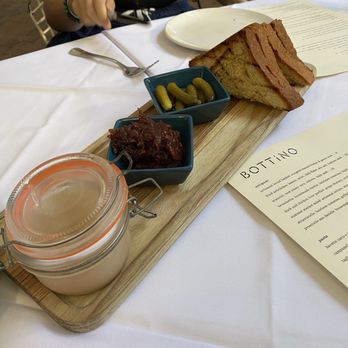 Bottino - Duck and chicken liver pâté with grape chutney, cornichons, and grilled brioche - Italian Near Me - New York, New York Bottino - Duck and chicken liver pâté with grape chutney, cornichons, and grilled brioche - Italian Near Me - New York, New York