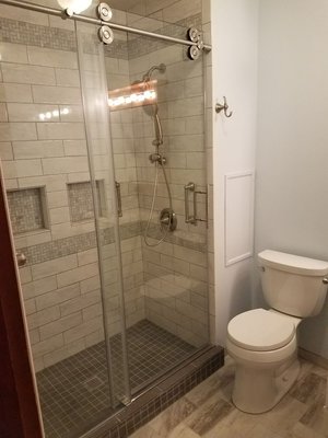 K J Miller Home Improvement Logo