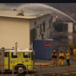 Palisades Charter High School - Fire fighters put out most of the fire (school may be fully burnt)