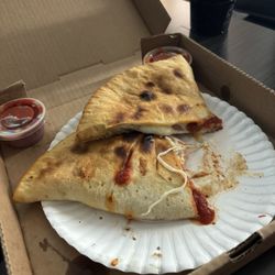 Paint's Underground Pizza - Calzone.... Super cheesy, excellent!
