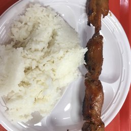 Chicken kebab with overcooked rice Chicken kebab with overcooked rice