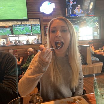 Miller's Ale House - Big red being gobbled up by blonde Abby - American Near Me - Media, Pennsylvania