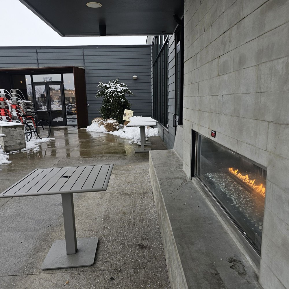 Whidbey Coffee - a patio with a fire place - Coffee & Tea Near Me - Burlington, Washington