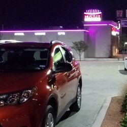 CareNow - If you miss the red and blue CareNow sign, look for the neon Hustler Hollywood sign.