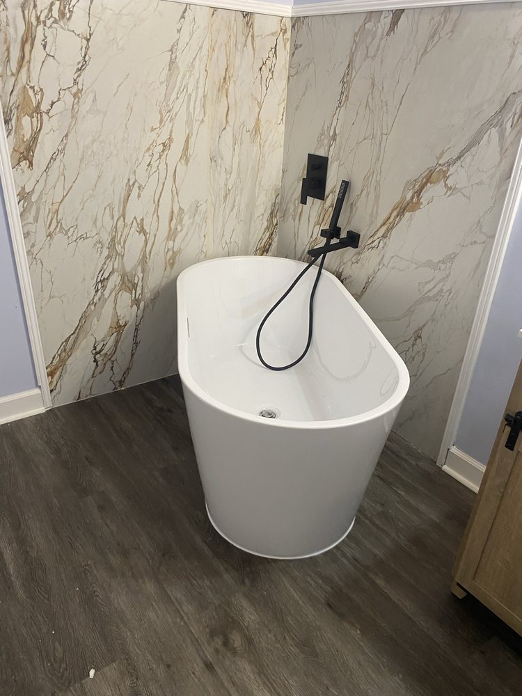 Slide of J Plumbing Service