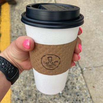 Zakary’s - a hand holding a coffee cup - Coffee & Tea Near Me - Gaffney, South Carolina