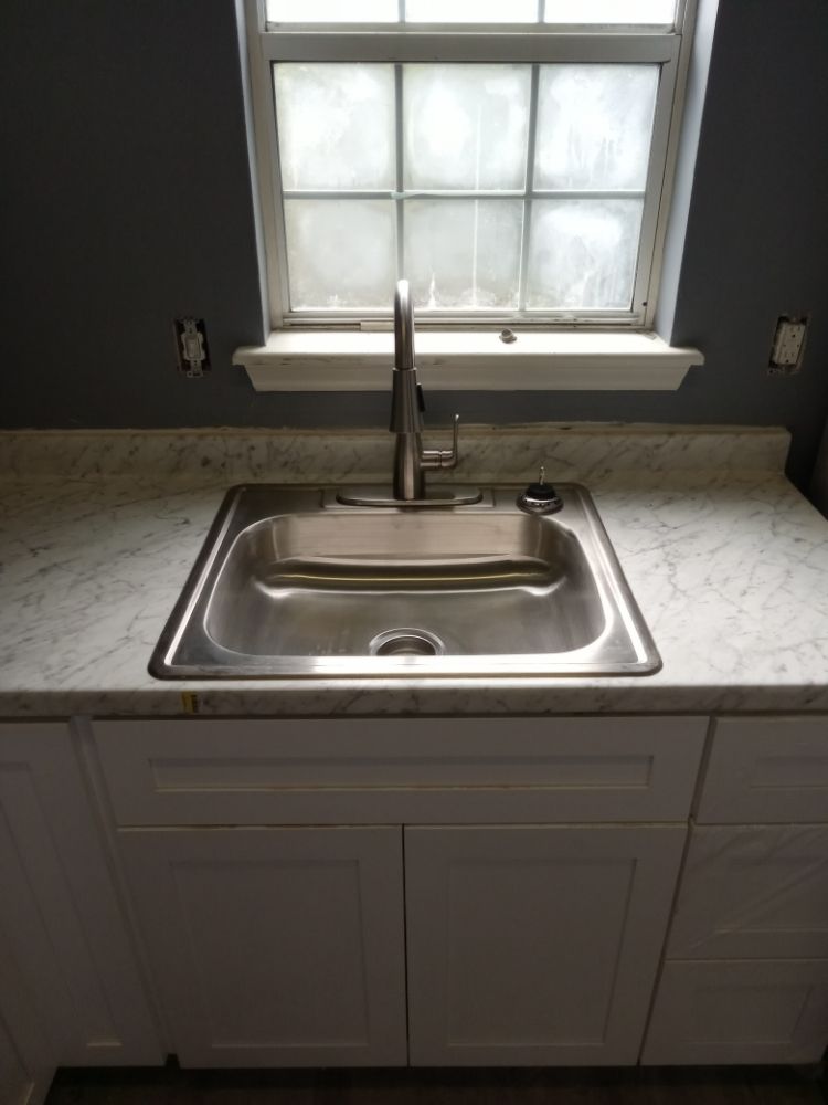 Slide of Great Scott Plumbing