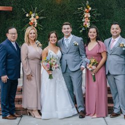 Noriega House - The couple and bride's family in front of the stage. We borrowed the cross from our church