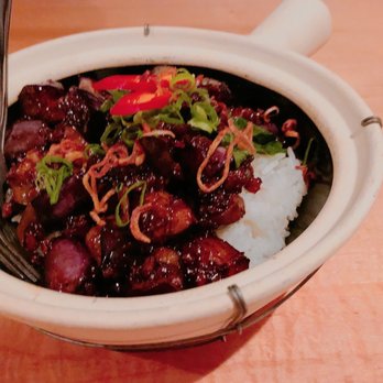 Fat Choi - a bowl of food with a spoon in it - Vegan Near Me - Toronto, Ontario