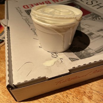 Alamo Pizza - a cup of yogurt on top of a book - Pizza Near Me - San Antonio, Texas Alamo Pizza - a cup of yogurt on top of a book - Pizza Near Me - San Antonio, Texas