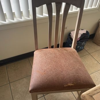 Bellows AFS Cabins - Ripped and filthy room and chair at Bellows Cabins - Hotels Near Me - Waimanalo, Hawaii