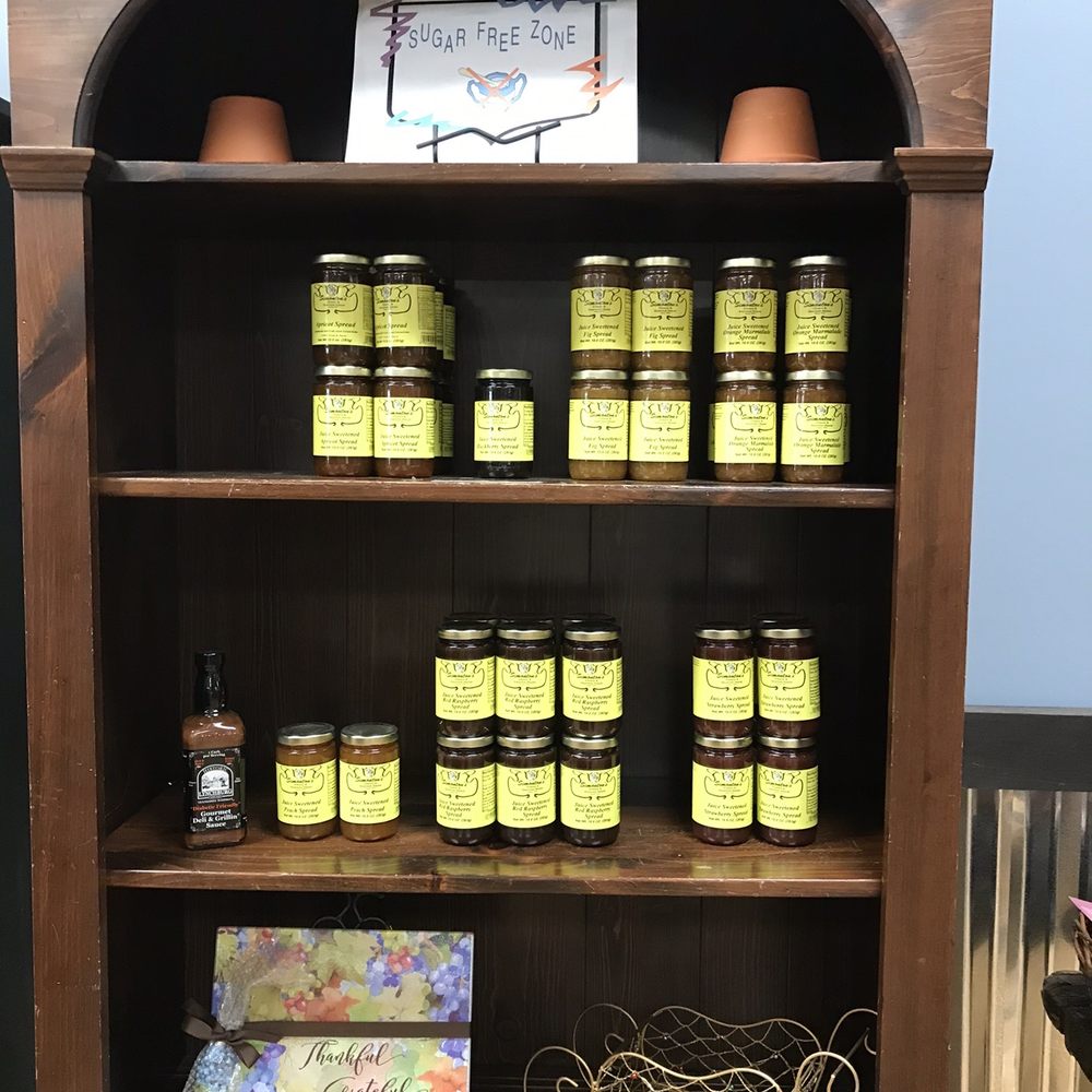 Simonton Cheese House - a display of jars of cheese - Specialty Food Near Me - Crossville, Tennessee Simonton Cheese House - a display of jars of cheese - Specialty Food Near Me - Crossville, Tennessee