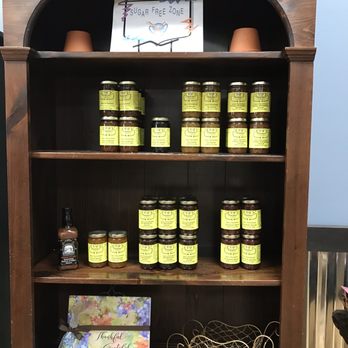 Simonton Cheese House - a display of jars of cheese - Specialty Food Near Me - Crossville, Tennessee Simonton Cheese House - a display of jars of cheese - Specialty Food Near Me - Crossville, Tennessee