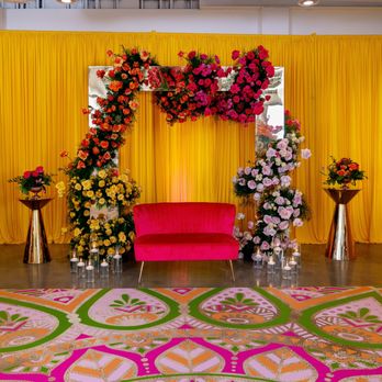 Thirty Plus Events - Love seat adorned with floral arrangements - Party & Event Planning Near Me Thirty Plus Events - Love seat adorned with floral arrangements - Party & Event Planning Near Me