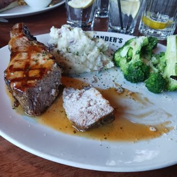 J. Alexander's - Porkchop showing the thickness of the chop - New American Near Me - Oak Brook, Illinois
