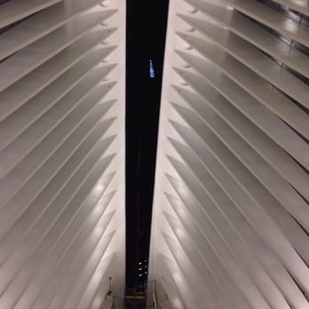 Oculus - the blue light seen through the window is one world trade center (Inside the Oculus-WTC Transportation Hub) - Landmarks & Historical Buildings Near Me - New York, New York