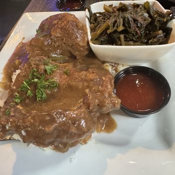 Virgil's Gullah Kitchen & Bar - Smothered pork chops will melt you where you stand. The flavor is a throwback to old skool soul food. Ain't no fusion here. - Southern Near Me - Atlanta, Georgia Virgil's Gullah Kitchen & Bar - Smothered pork chops will melt you where you stand. The flavor is a throwback to old skool soul food. Ain't no fusion here. - Southern Near Me - Atlanta, Georgia